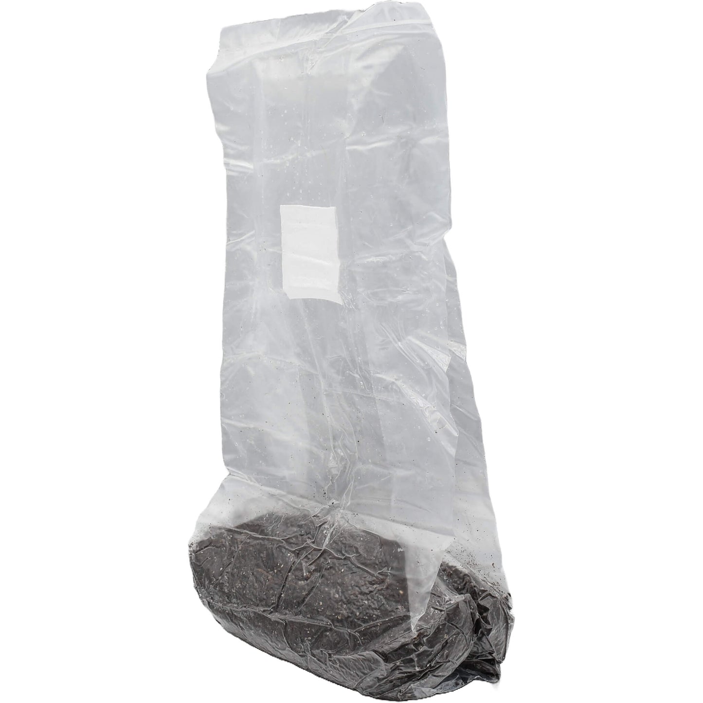 1 pound grow bag of manure based  mushroom substrate standing facing left