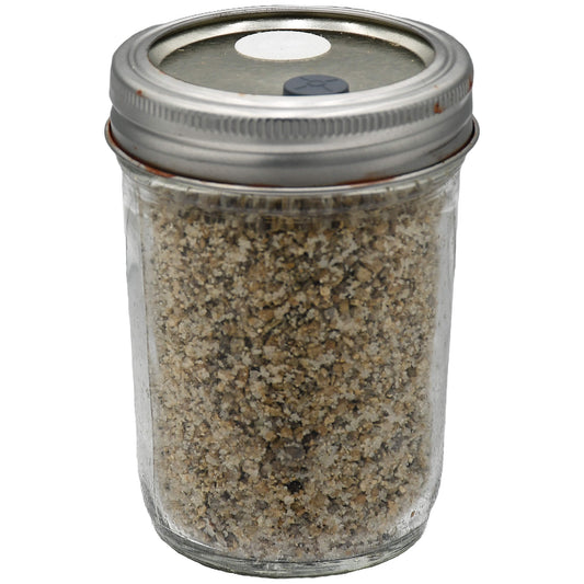 1 half pint jar of brown rice flour and vermiculite mushroom substrate